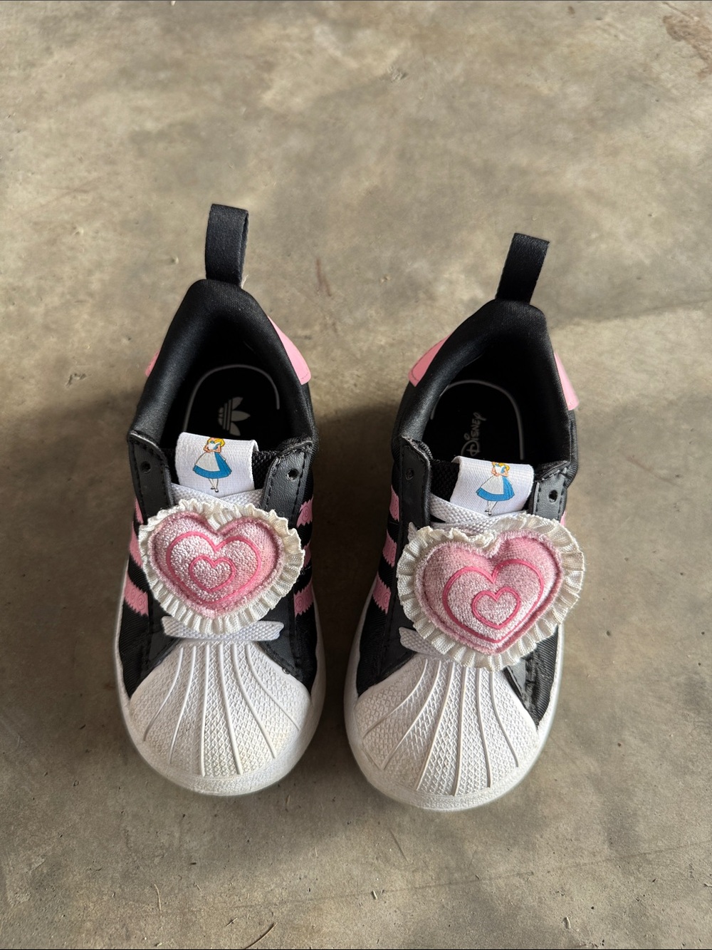 Adidas superstar Disney collab Alice and wonderland